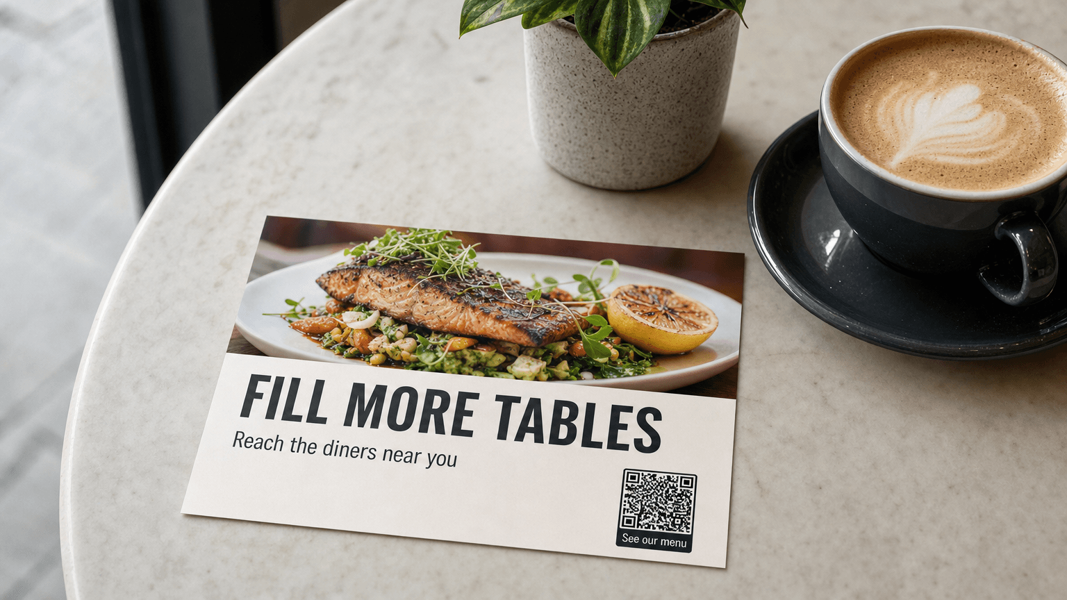 A restaurant marketing postcard reading 'Fill More Tables' on a cafe table.
